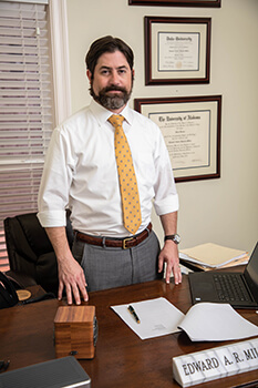 Edward Miller at his desk in Daphne, AL